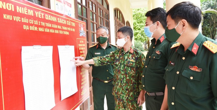 Bầu cử trong tâm dịch COVID-19: Ngập tràn tự hào, nghiêm túc tuân thủ quy định phòng dịch - ảnh 13