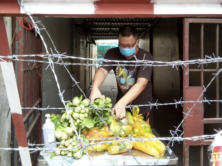 Tình người trong đại dịch ở Thành phố Hồ Chí Minh - ảnh 20