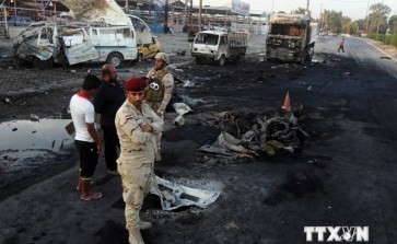イラク・首都近郊で相次ぐ爆弾テロ - ảnh 1