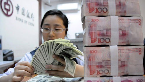 中国 人民元「基準値」３日連続引き下げ - ảnh 1