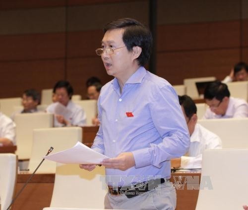 国会議員ら、第12回党大会に提出される大会議案に賛成 - ảnh 1