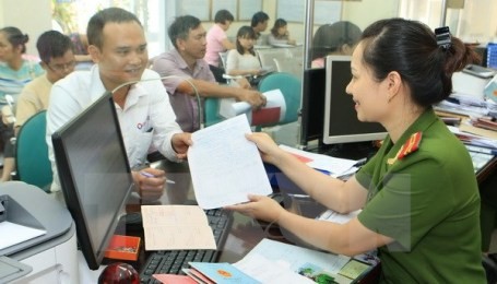 国家機関のサービスに人民の満足度を評定する協力プログラム - ảnh 1