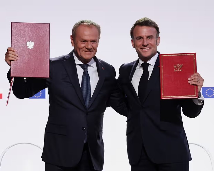 仏・ポーランド、安保協力強化で条約 ロシアを念頭に脱・米依存へ - ảnh 1