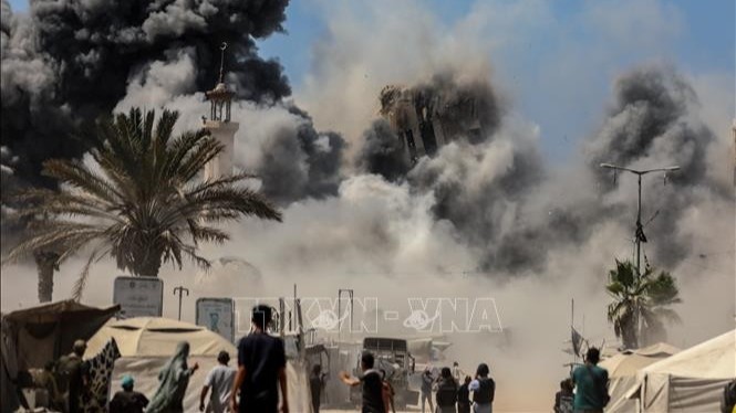 停戦は未発表のまま、イスラエルがガザ空爆を継続 - ảnh 1