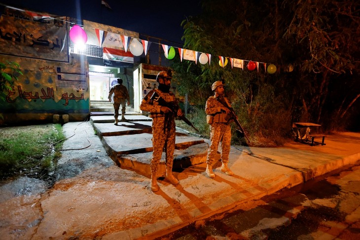 イラク総選挙期日前投票、投票率は6割 - ảnh 1