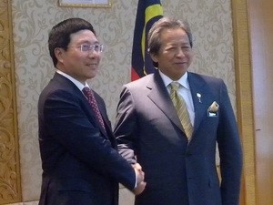 Menlu Vietnam Pham Binh Minh melakukan kunjungan resmi di Malaysia  - ảnh 1