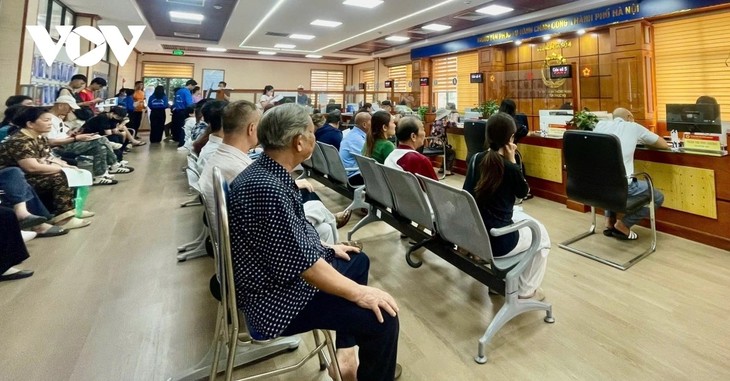 实行一个月来，越南两级地方政府稳定、顺畅运作 - ảnh 1