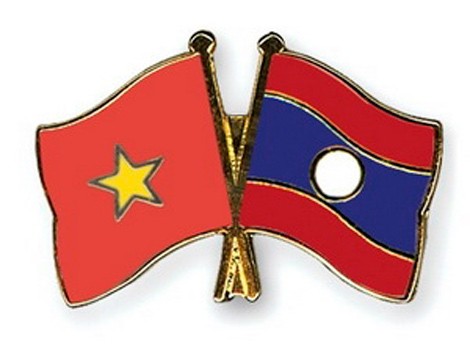 Deputi PM Vietnam Nguyen Xuan Phuc menerima Deputi PM Laos - ảnh 1