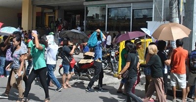 Setengah juta penduduk Filipina mengungsikan untuk menghindari taufan Hagupit - ảnh 1