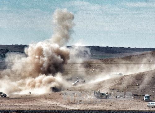 Pasukan orang Kurdi memundurkan IS dari kota madya Kobane - ảnh 1