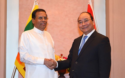 PM Nguyen Xuan Phuc melakukan pertemuan bilateral di sela-sela Konferensi Tingkat Tinggi G-7 yang diperluas - ảnh 1