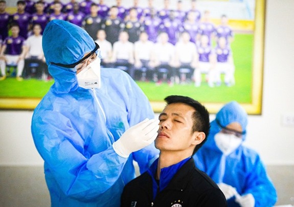 Fußballer des Fußballvereins Hanoi FC versammeln sich nach dem Tetfest - ảnh 1