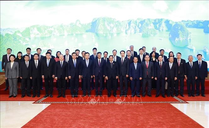 Premierminister Pham Minh Chinh empfängt den Parteisekretär des Autonomen Gebiets Guangxi der Zhuang - ảnh 1
