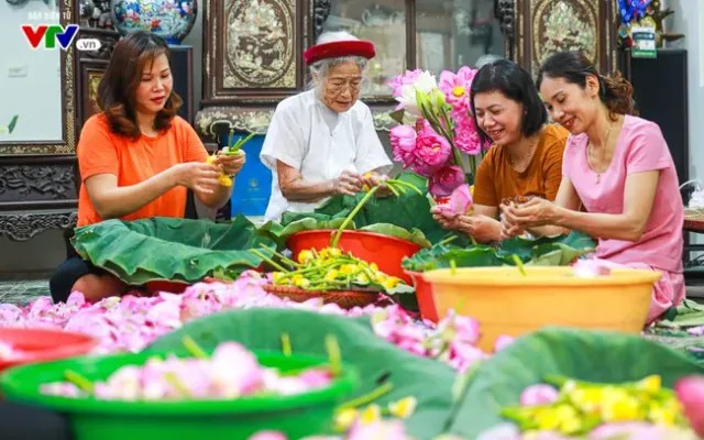 Der Beruf zur Herstellung von Lotustee in Quang An wird nationales immaterielles Kulturerbe - ảnh 1