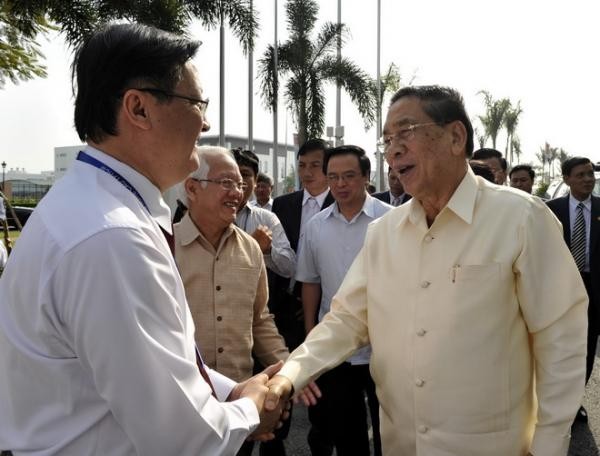 Sekjen, Presiden RDR Laos berkunjung di zona teknologi tinggi kota Ho Chi Minh - ảnh 1