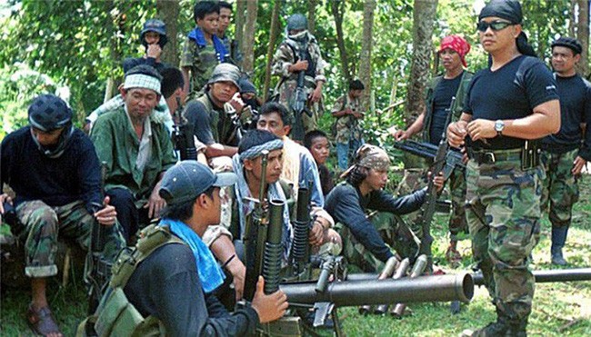 Filipina, Malaysia dan Indonesia bekerjasama untuk menentang kelompok pembangkang Abu Sayyaf - ảnh 1