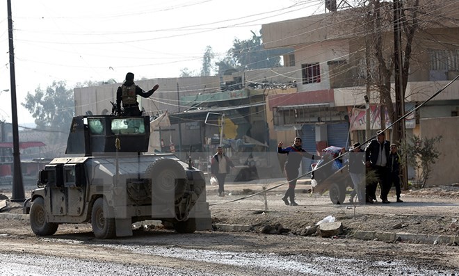 Pasukan-pasukan Irak memperketat kepungan terhadap IS di kawasan Mosul Barat - ảnh 1