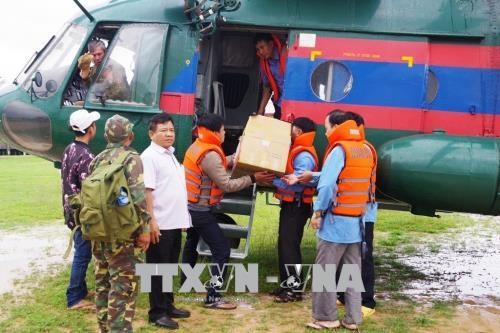 Viet Nam memberikan bantuan kepada Laos dalam kasus bobolnya waduk hidrolistrik Sepien Senamnoi - ảnh 1