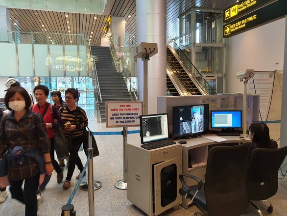 Grup turis dari Wuhan (Tiongkok) yang berkunjung di Kota Da Nang, Vietnam, belum ada indikasi yang bersangkutan dengan wabah penyakit radang paru-paru Corona - ảnh 1