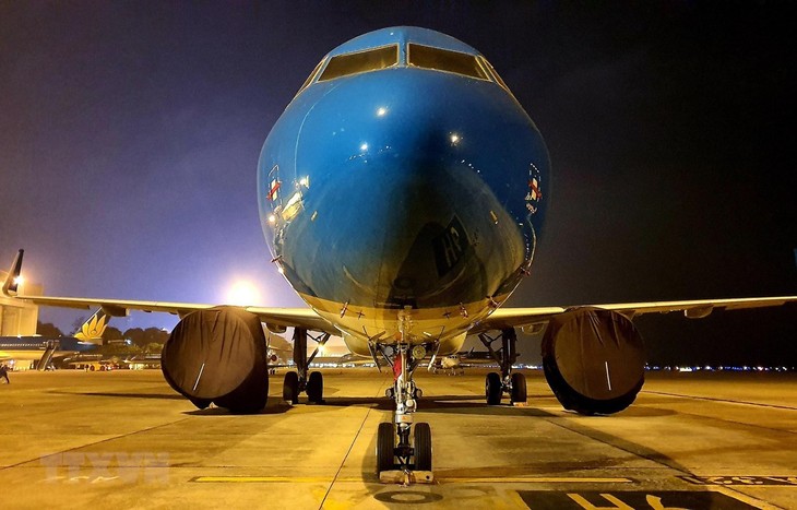 Vietnam Airlines mengangkut warga negara Vietnam di Jepang pulang ke tanah air - ảnh 1