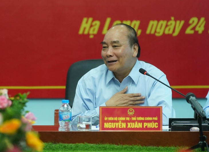 PM Nguyen Xuan Phuc berkunjung dan melakukan ceramah kepada para buruh tambang Ha Lam - ảnh 1