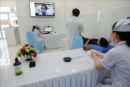 Membuat Perangkat Kriteria Klinik yang Aman untuk Mencegah dan Menanggulangi Covid-19 - ảnh 1