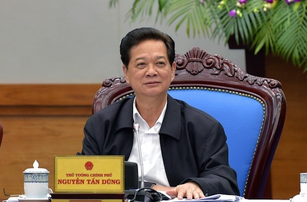 PM Nguyen Tan Dung melakukan kunjungan kerja di Laos - ảnh 1