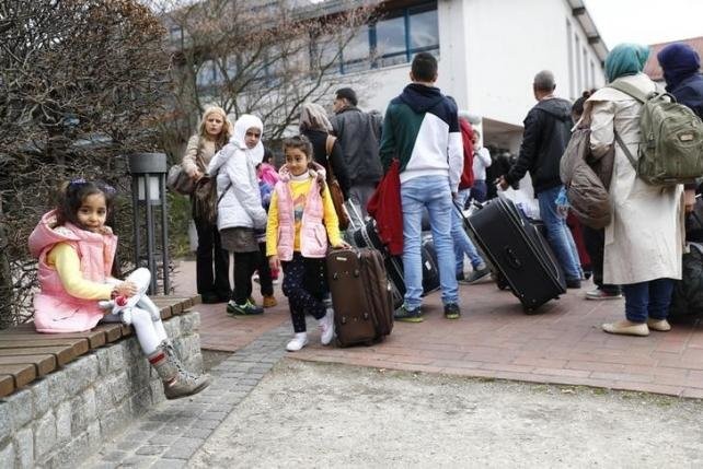 Jerman akan harus membayar lebih dari 100 miliar dolar AS untuk menangani krisis migran - ảnh 1