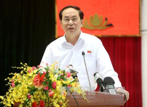 Presiden Tran Dai Quang melakukan kontak dengan para pemilih kota Ho Chi Minh - ảnh 1