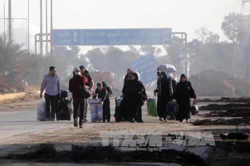 Tentara Suriah memberitahukan menjalankan gencatan senjata kemanusiaan di kota Aleppo - ảnh 1