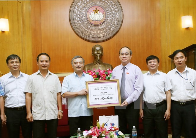 Ketua Pengurus Besar Front Tanah Air Vietnam menyerukan bantuan untuk rakyat yang terpengharuh oleh  - ảnh 1