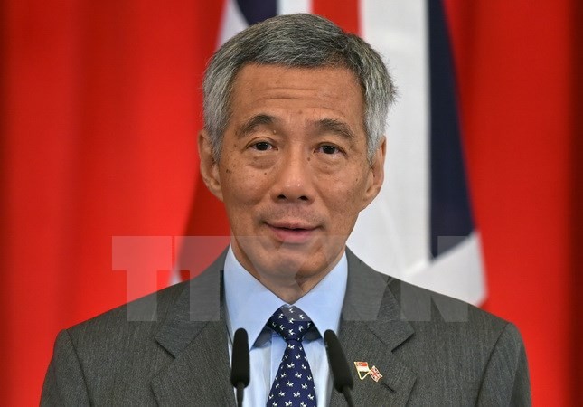 PM Singapura, Lee Hsien Loong melakukan kunjungan resmi ke Vietnam dari 21-23/3 - ảnh 1