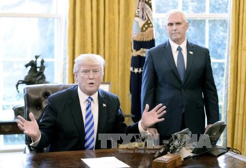 Presiden AS, Donald Trump menandatangani dekrit menghapuskan kebijakan-kebijakan mengenai perubahan iklim pada tahap Pemerintah pimpinan Presiden Barack Obama - ảnh 1