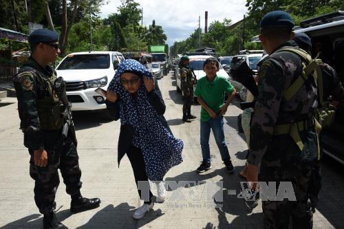  Filipina memperkuat operasi pembersihan  terhadap kaum pembangkang Islam di Marawi - ảnh 1