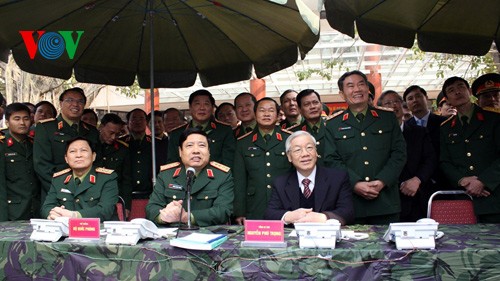 Party leader pushes for building a stronger army - ảnh 1