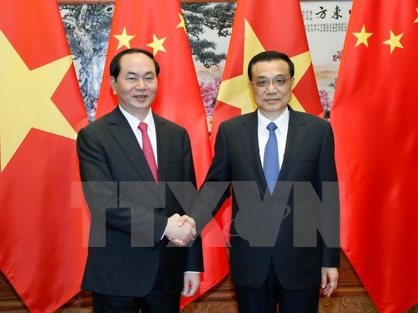 President Tran Dai Quang meets Chinese Premier Li Keqiang  - ảnh 1