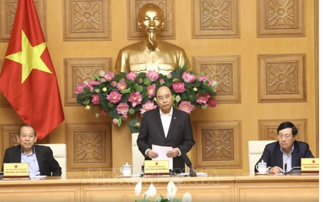 Prime Minister orders fighting Covid-19 and developing economy  - ảnh 1