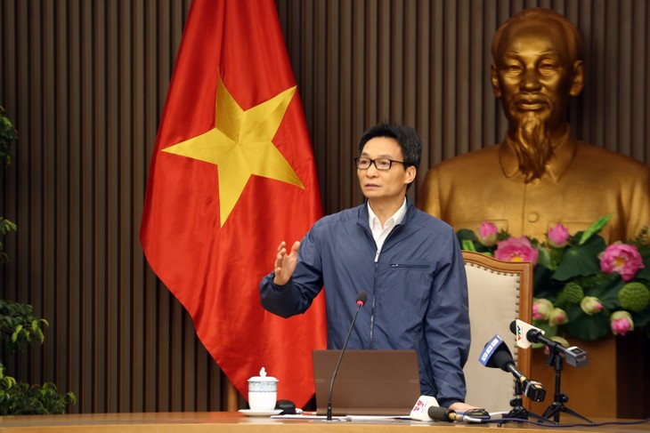 Deputy PM vows to maintain COVID-19 response achievements - ảnh 1