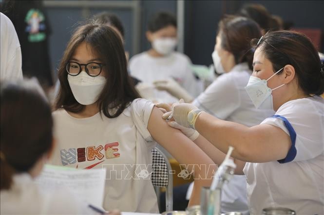 Vietnam reports 3,107 new cases of COVID-19 on Wednesday  - ảnh 1