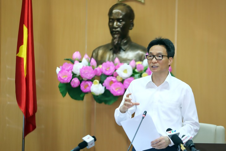 政府副总理武德担：控制疾病、安全共处、积极调控 - ảnh 1