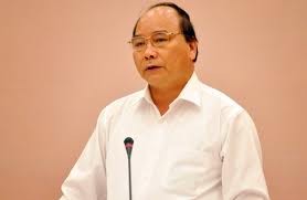 Deputy Prime Minister Nguyen Xuan Phuc visits Laos  - ảnh 1