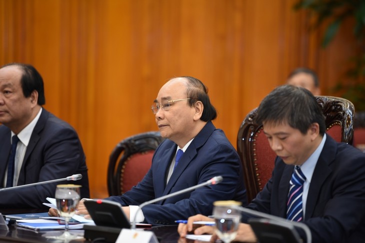 Official welcome ceremony for Japanese PM in Hanoi - ảnh 11