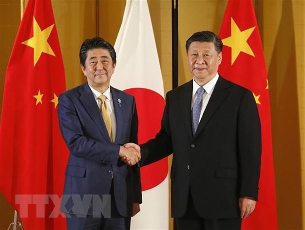 Abe, Xi vow to boost regular, close communication  - ảnh 1