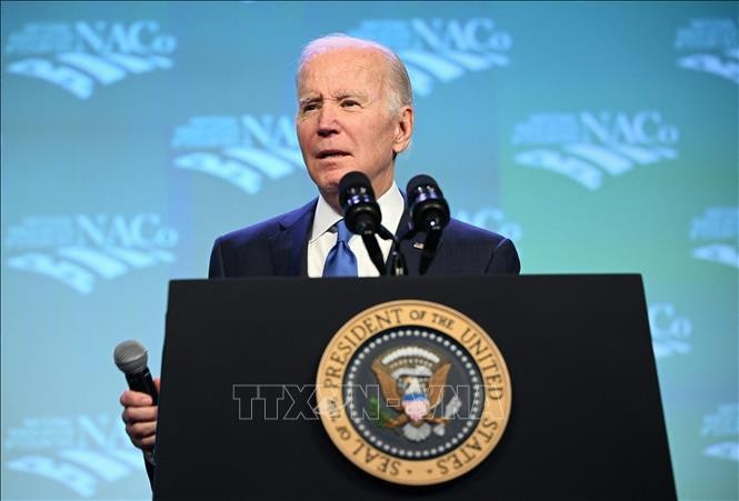 Biden calls for stricter gun control measures  - ảnh 1