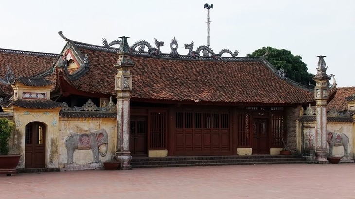 Exposición sobre casa comunal y la urgencia de proteger esta reliquia cultural - ảnh 1