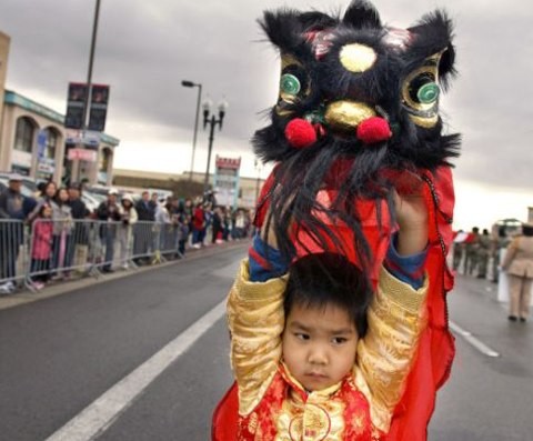 Celebran vietnamitas Tet 2014 en Reino Unido y Estados Unidos  - ảnh 2