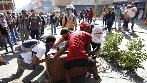 Continúan manifestaciones opositoras a Maduro en Venezuela - ảnh 1