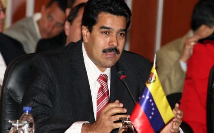 Se compromete presidente venezolano a impulsar economía en 2015 - ảnh 1