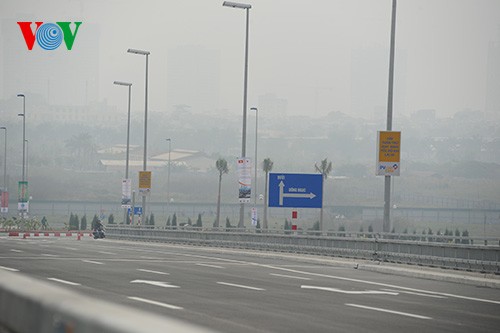 El panorama de la puente de Nhat Tan y la carretera más moderna de Hanoi - ảnh 10