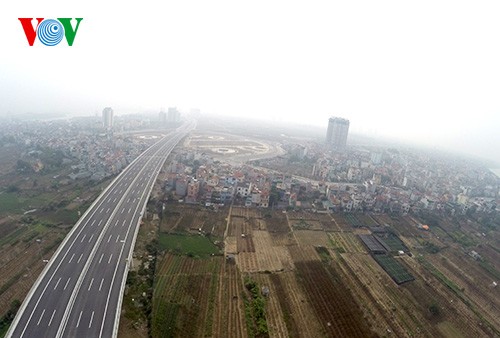 El panorama de la puente de Nhat Tan y la carretera más moderna de Hanoi - ảnh 8